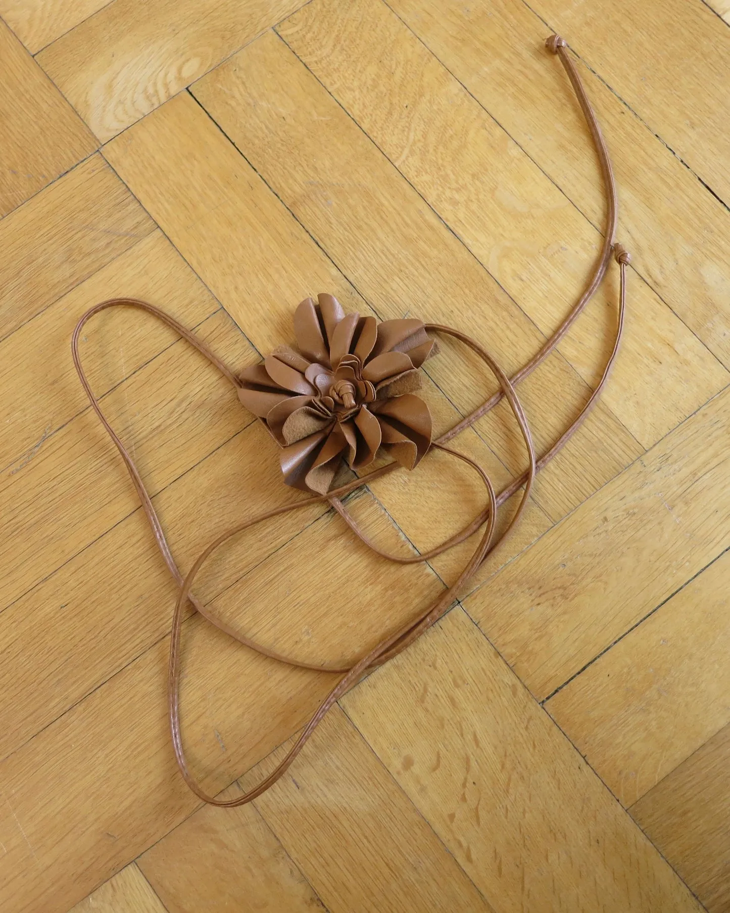       Brown leather flower accessory    